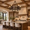 California mission forged iron chandelier displayed in a warm rustic kitchen setting