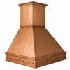 Angled view hand hammered tapered honey copper range hood with rope trim and riveted apron
