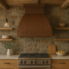 Rustica kitchen with a recirculating copper range hood