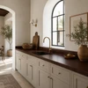 Modern mediterranean style kitchen with a handcrafted hammered copper kitchen countertop and with a backsplash