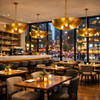 Designer brass half bowl pendant lamp in a cafe with floor to ceiling windows and busy downtown city view at night