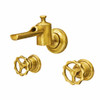 Solid brass wall mounted faucet with exposed industrial geometry and wheel handles in golden honey finish, three piece configuration with warm metallic sheen
