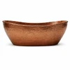 Hammered polished copper bathtub oval shape natural patina finish centered on white background highlighting hammered texture