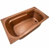 Hammered drop-in copper bathtub with armrests in angled view showing deep basin and warm hammered copper finish