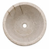 Top view of round cantera stone vessel sink with centered drain hole and handcrafted stone surface