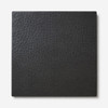 Dark hammered metal surface finish of New York style industrial zinc range hood, charcoal gray texture with handcrafted hammer marks and subtle sheen