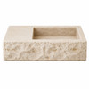 Handcrafted cantera stone sink front view on white background with rough exterior and square basin