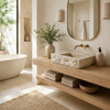 Handcrafted cantera stone bathroom sink in bright Organic Modern bathroom with floating oak vanity and brushed brass fixtures