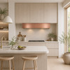 Hand-polished hammered under-cabinet copper range hood beneath light wood cabinets in a Scandinavian organic kitchen