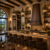 Wine bar tasting room with tall antique copper range hood, stone walls, wood beams and handcrafted Mediterranean interior