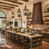 Historic-inspired hospitality kitchen with tall hand-hammered copper range hood, mission architecture and commercial cooking line