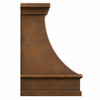 Side view of custom hammered copper range hood showing curved bell profile, projecting apron and layered crown molding