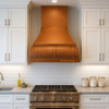 Smooth 30-inch copper range hood Italian style in a transitional kitchen