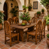 Rustic Mexican wooden chair with arched back and slatted seat on a Spanish patio