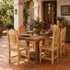Rustic Mexican wooden chair with woven seat and scalloped back on a Spanish patio