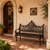 Ornate chocolate aluminum rustic garden bench with victorian scrollwork design in villa entry