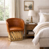 Traditional Mexican equipal armchair in cherry wood and pig skin in a bedroom