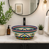 talavera cone shape round bath sink cobalt floral design in a modern bathroom with minimal decor and open window lighting