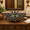 Talavera bath sink blue floral pattern design in a modern bathroom vanity with natural light and clean finishes