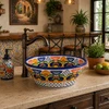 Floral talavera round bath cone shape vessel sink in kitchen bar with rustic countertop and decorative setting