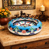 Turquoise floral talavera vessel Mexican bathroom sink design in Spanish Revival bathroom with tile and wrought iron details