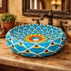 Talavera vessel bathroom sink donut floral design handmade in Spanish Revival bathroom with warm tones