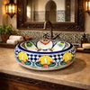 Round talavera vessel Mexican bathroom sink yellow floral on Spanish vanity with rustic wood accents