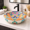 Talavera vessel bathroom sink symmetric floral design in a modern bathroom with clean lines and bright contrast