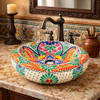 Talavera vessel bathroom sink symmetric floral design in a Spanish Revival bathroom with warm traditional elements