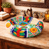 Round talavera vessel Mexican bathroom sink multicolor floral on Spanish vanity with rustic finishes