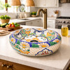 Round talavera vessel Mexican bathroom sink white floral on kitchen island with bright natural light
