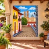 Spanish colonial village with Mexican tile mural in a hacienda courtyard with stone paving and pottery.