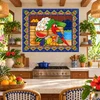 Mexican tile mural parrot fruits in a tropical kitchen with colorful handcrafted decor.