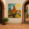 Rooster sunrise Mexican tile mural enhancing a Spanish Revival patio space with terracotta flooring and arched windows