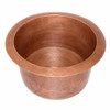 Hammered round copper bar sink for rustic kitchens seen from the angle