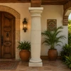 Mexican hacienda cantera column with tapered entasis at a traditional hacienda entryway