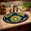 Mexican talavera sunflower sink installed in a kitchen space featuring artisan surfaces and traditional ceramic accents