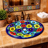 Talavera bathroom sink cobalt pansy featured in a restaurant restroom adding vibrant color and artisan character