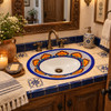Oval Mexican floral lattice with white bottom bathroom sink in a vintage powder room
