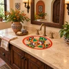 Oval talavera bathroom sink terracotta floral lattice motif in a warm hacienda powder room