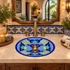 Oval talavera bathroom sink blue floral lattice design in a Mediterranean stone vanity