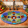 Oval mexican talavera clover medallion bathroom sink installed in hacienda style kitchen with tile counter
