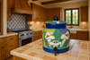 Talavera calla lily water crock displayed on a kitchen counter adding handcrafted color and artisan charm
