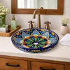 Talavera above counter sink floral rosette design style in bathroom vanity with clean surfaces and bright open space