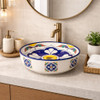 Talavera above counter Mexican bathroom sink quatrefoil design in modern bathroom with neutral palette and clean lines