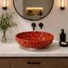 Talavera above counter Mexican bathroom sink mandala design in modern bathroom with clean lines and neutral finishes