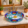Talavera above counter fish design round vessel sink in bathroom vanity with warm tones