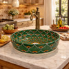 Talavera above counter round drop in vessel sink in kitchen island with natural light