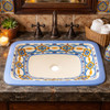 Rectangular talavera bathroom sink blue geometric pattern design featured in restaurant bathroom with artisan decor