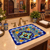 Rectangular talavera bathroom sink intricate floral geometric design featured in restaurant bathroom with artisan decor